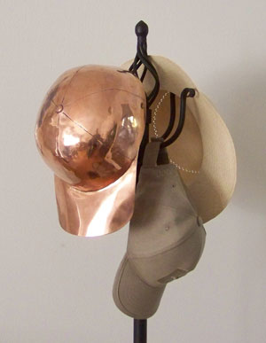 Copper Baseball Cap on Coatrack